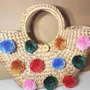 Woven, Rattan Bag, Purse  round Handle with Colorful Pom Poms. New. No tags.